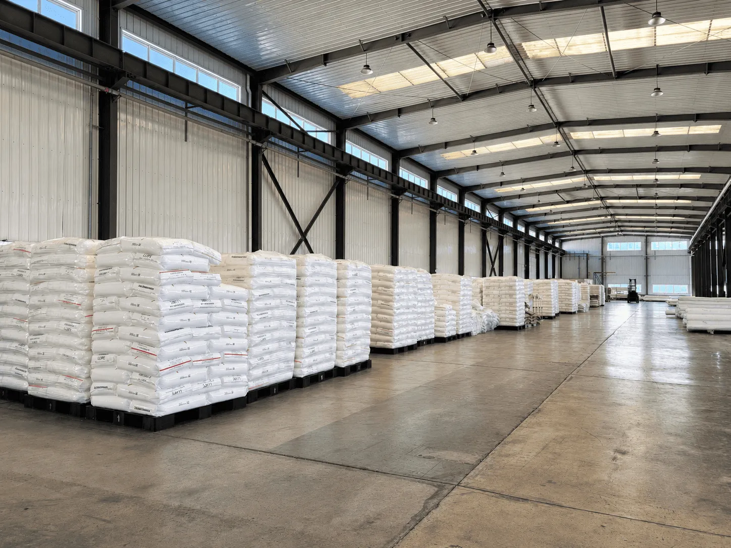 Raw materials organized inside the Glory Bridge warehouse