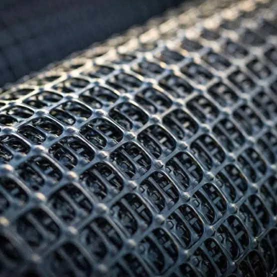 Biaxially stretched plastic geogrid for reinforcement applications