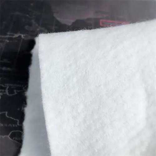 Roll of polyester continuous-filament nonwoven geotextile
